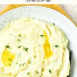 A spoon in a bowl of mashed potatoes