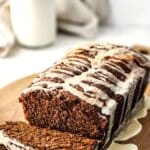 Gluten-free gingerbread loaf drizzled in eggnog glaze.