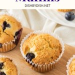 Blueberry almond flour muffins on wooden board.