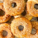 Gluten-free apple cider donuts on wire rack
