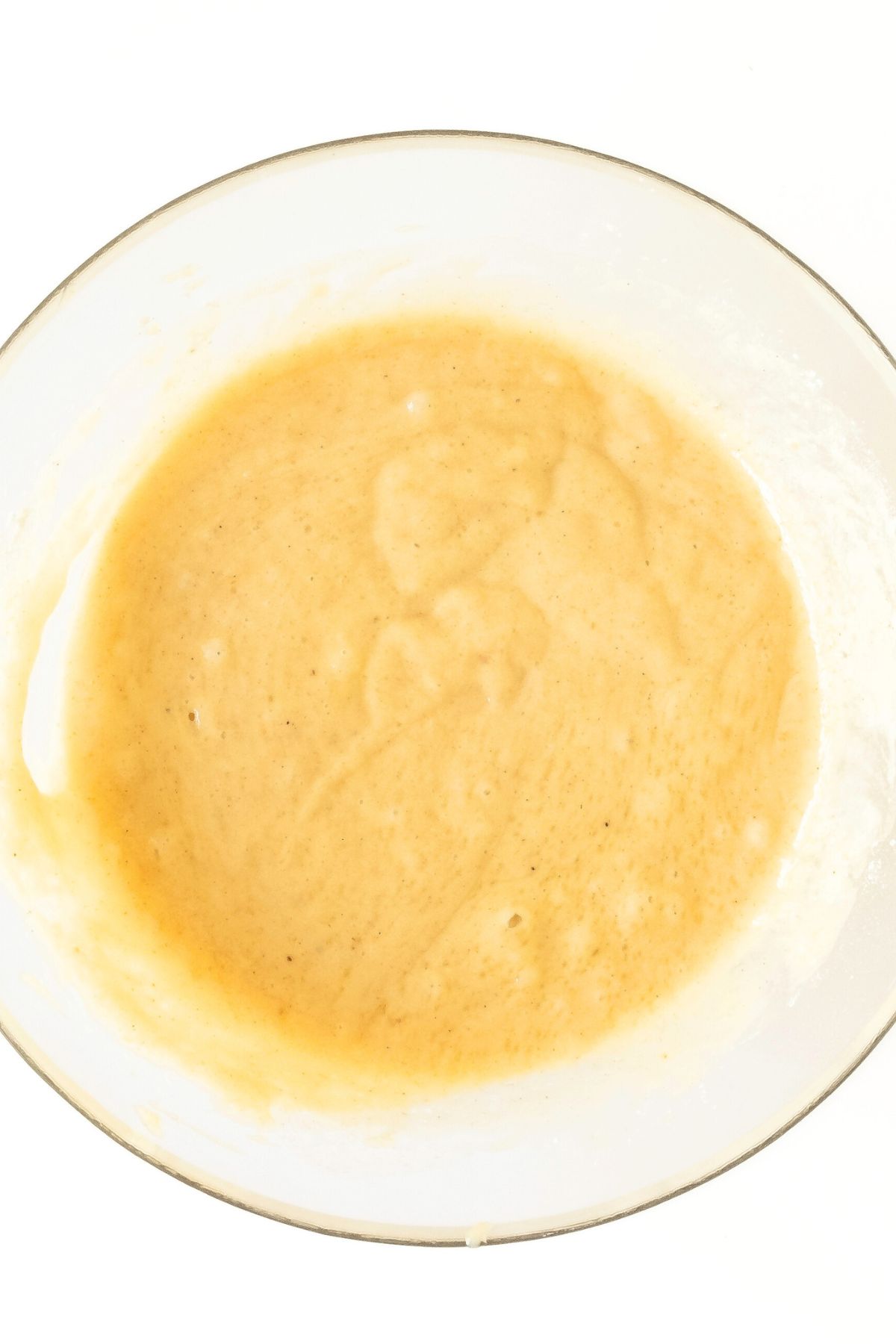 A large bowl of donut batter