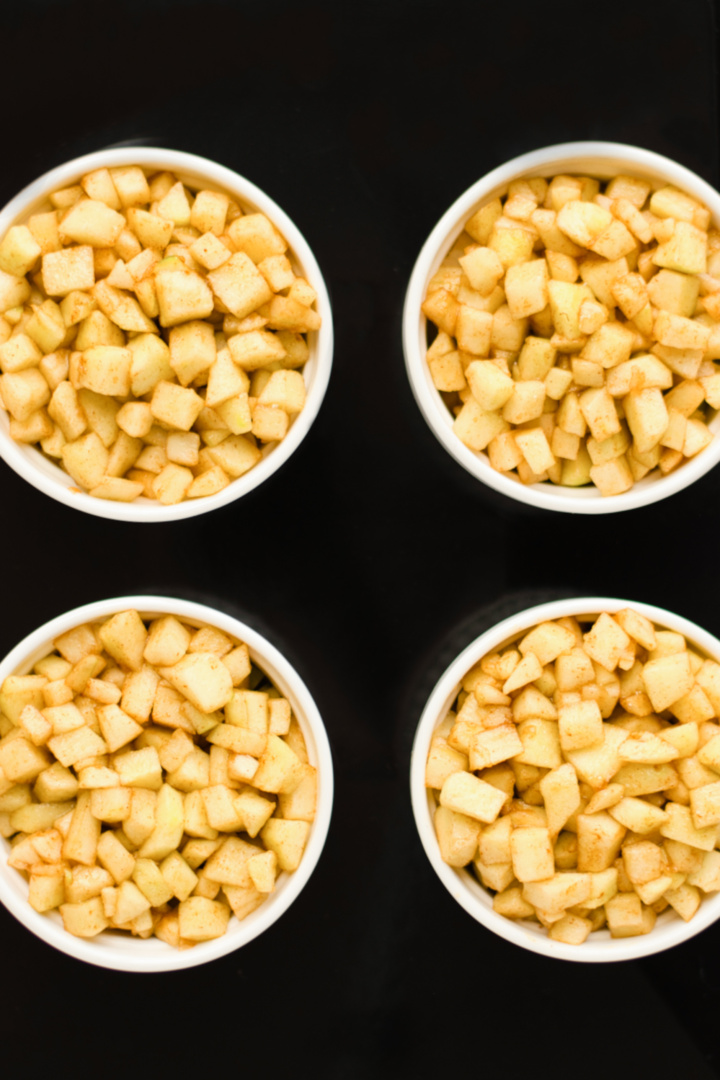 Cubed apples in ramekins.