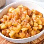 A bowl of homemade apple pie filling.