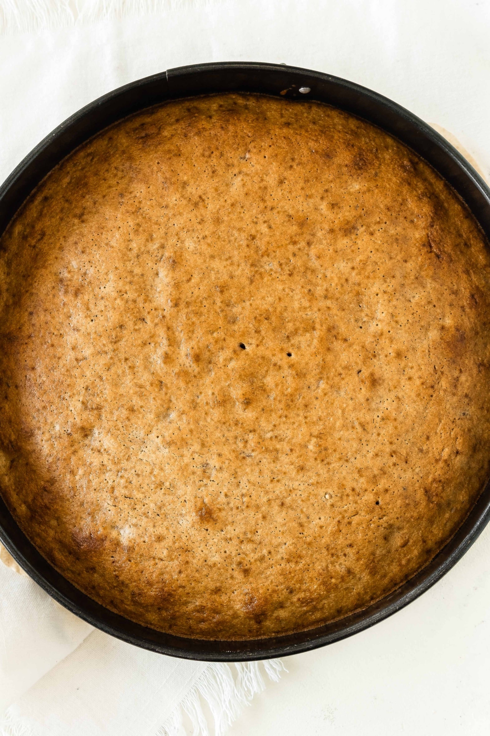 Freshly baked banana cake in springform pan.