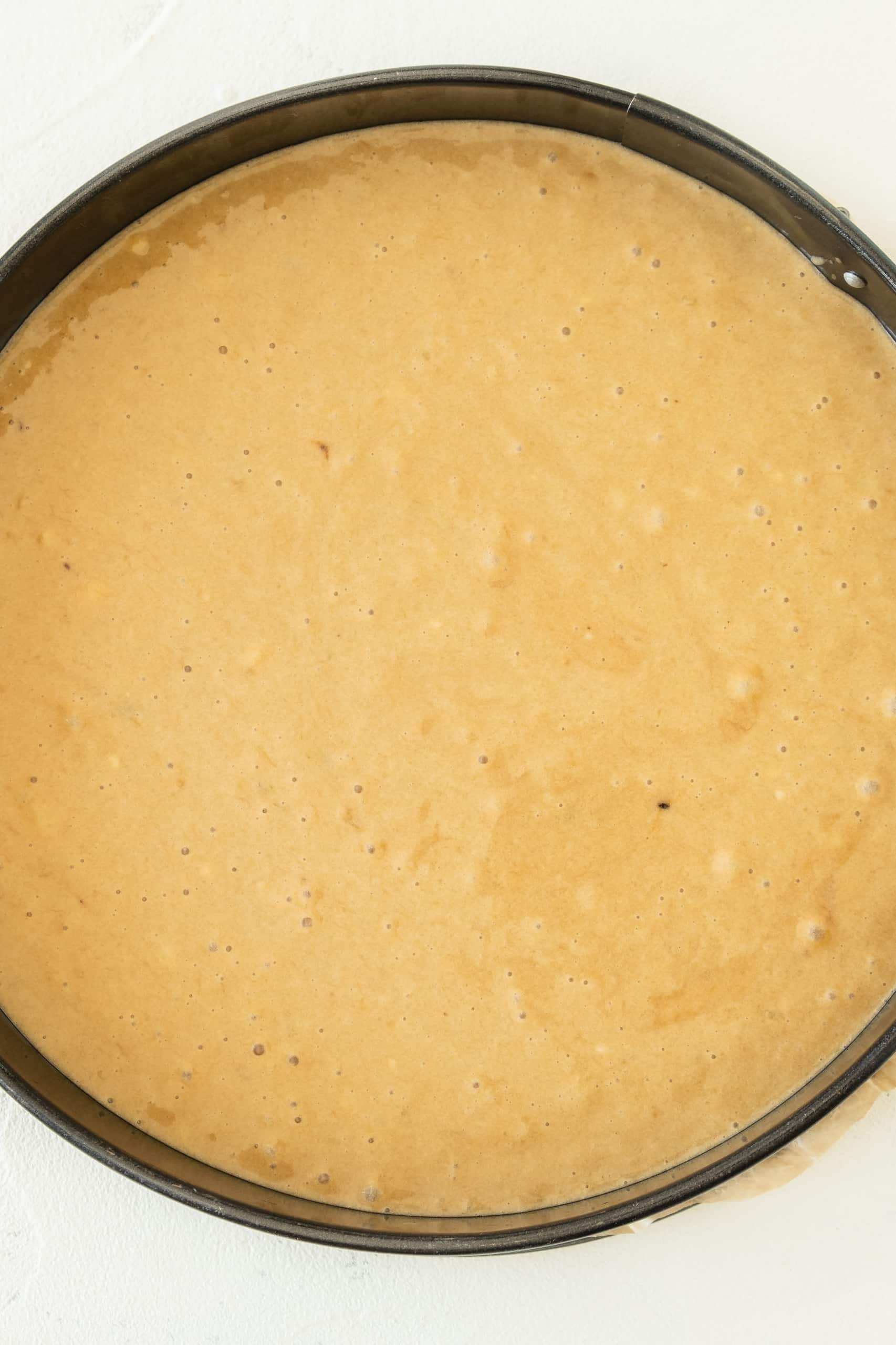 Gluten-free banana cake batter in cake pan.