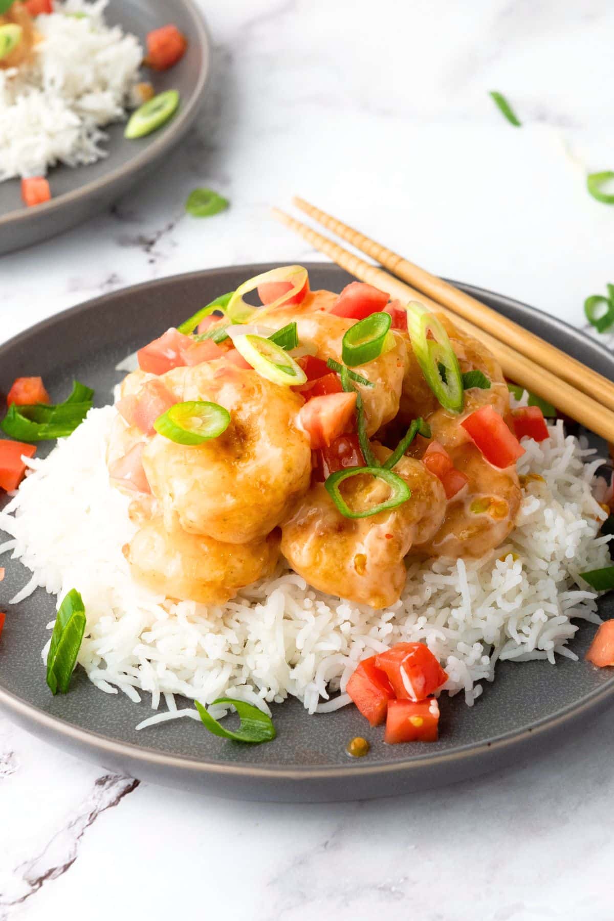 A plate of bang bang shrimp and rice