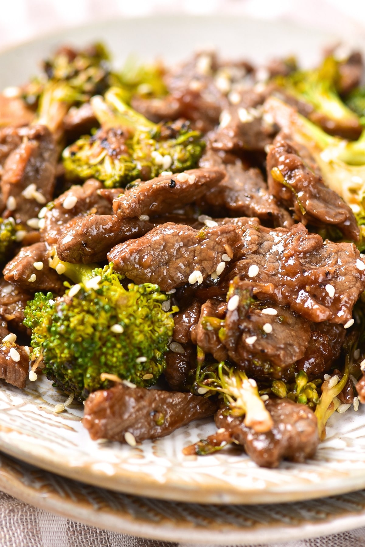 Up close shot of beef stir fry on plate.