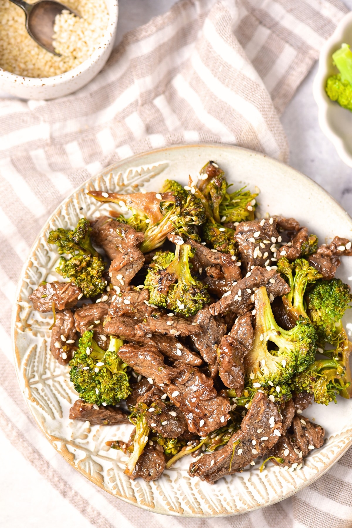 Up close shot of a plate of gf broccoli beef on plate.