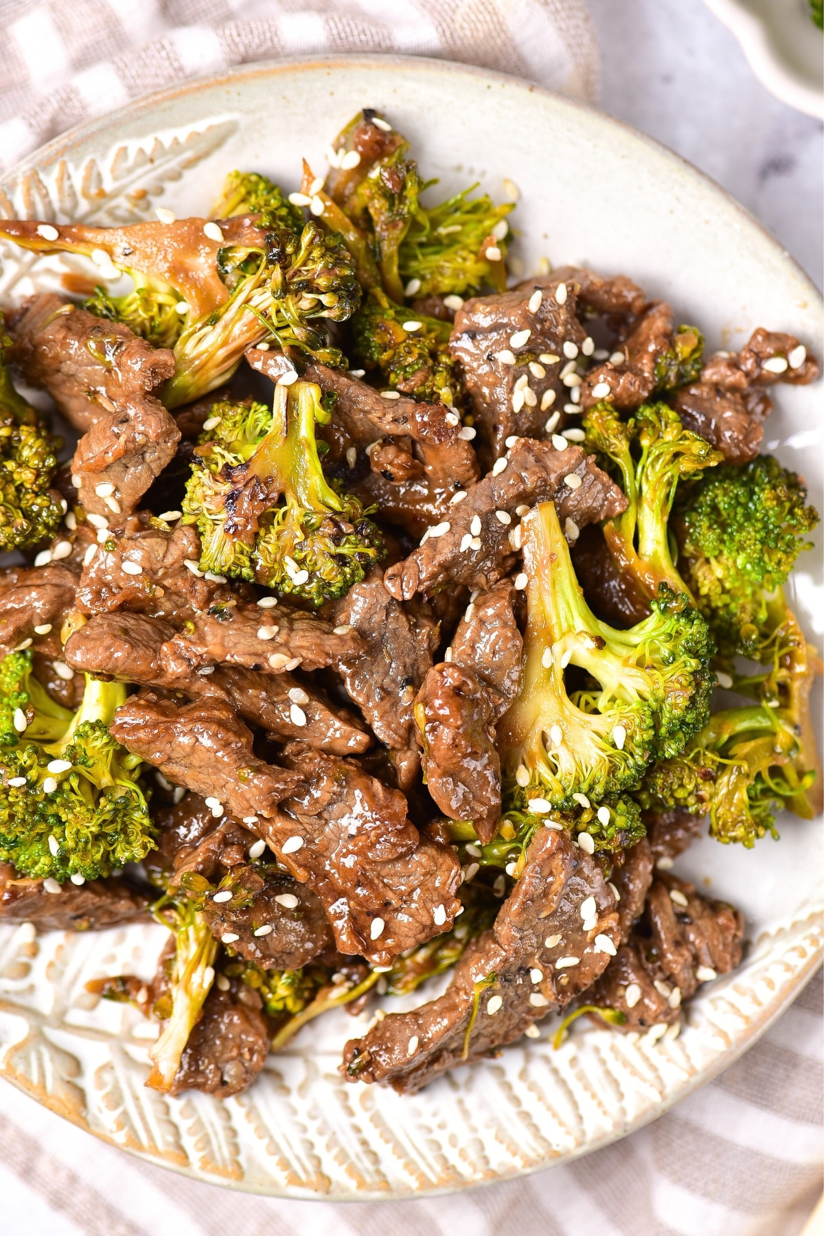 Top down view of a plate of gf beef and broccoli.