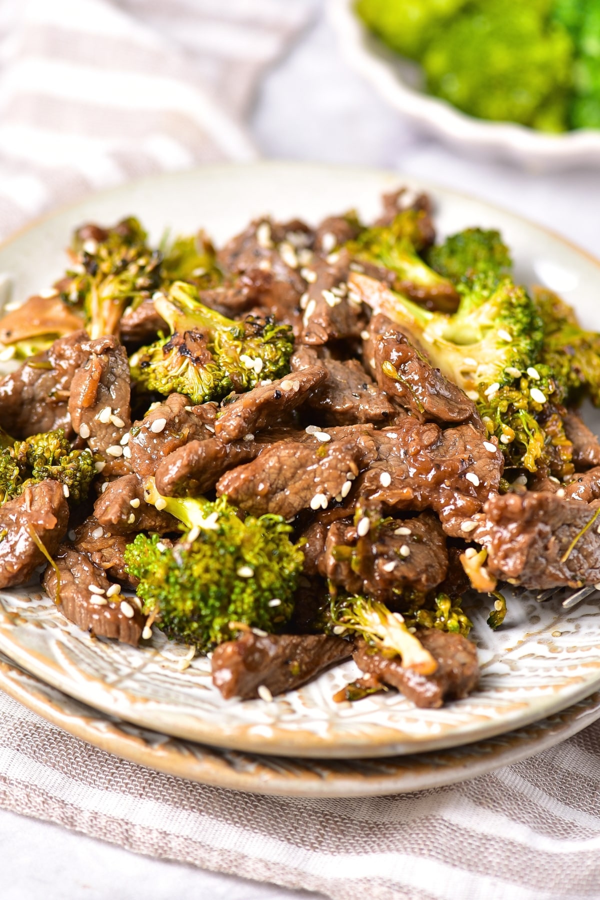 Gluten-free beef and broccoli on a plate.