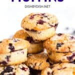 Blueberry muffins stacked in a pyramid.