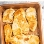 Top down view of sheet pan with gf breaded chicken