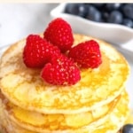 Buttermilk pancakes topped with fresh berries.