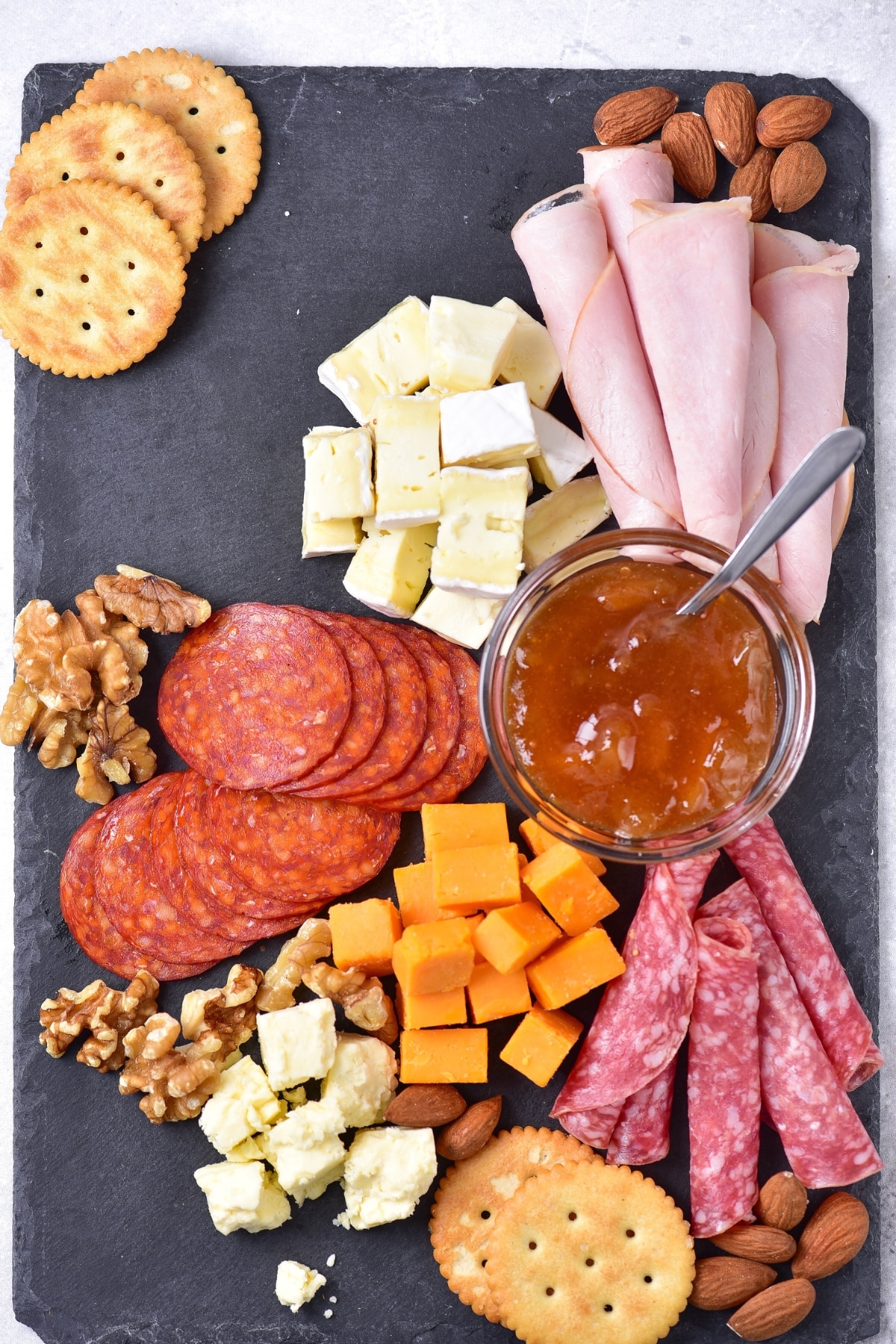 Preparing charcuterie board.
