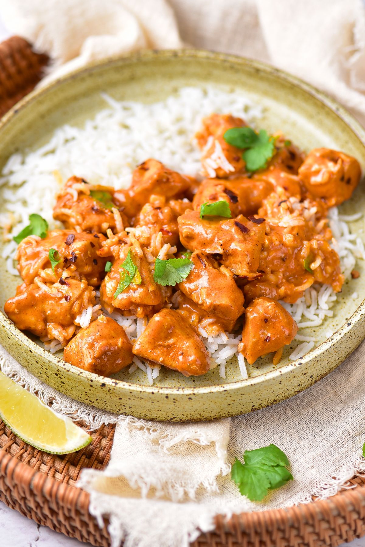 Up close view of a plate of gluten-free curry chicken.