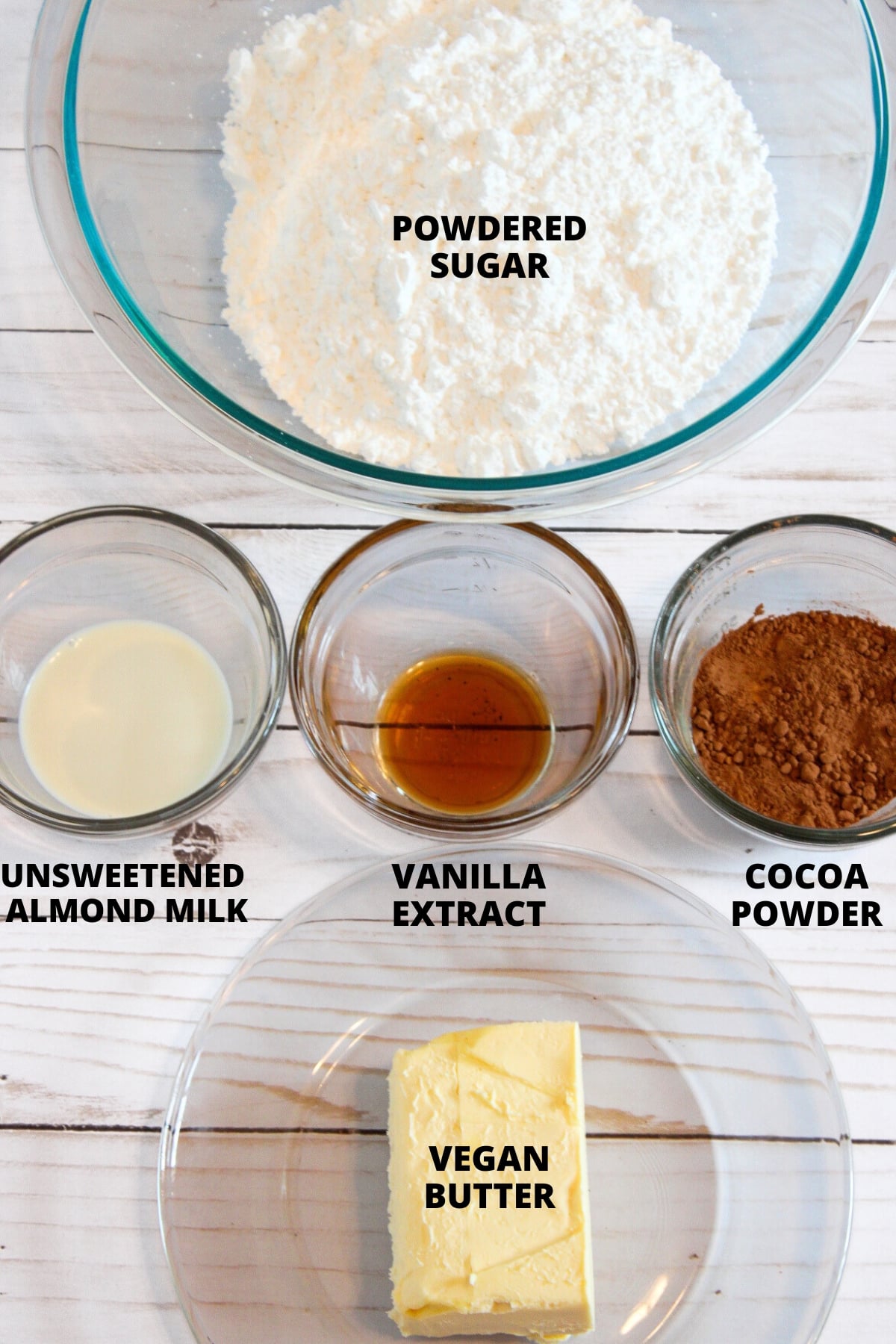 Ingredients for gluten-free buttercream frosting laid out on board.