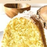 Up close shot of a slice of coconut cake.