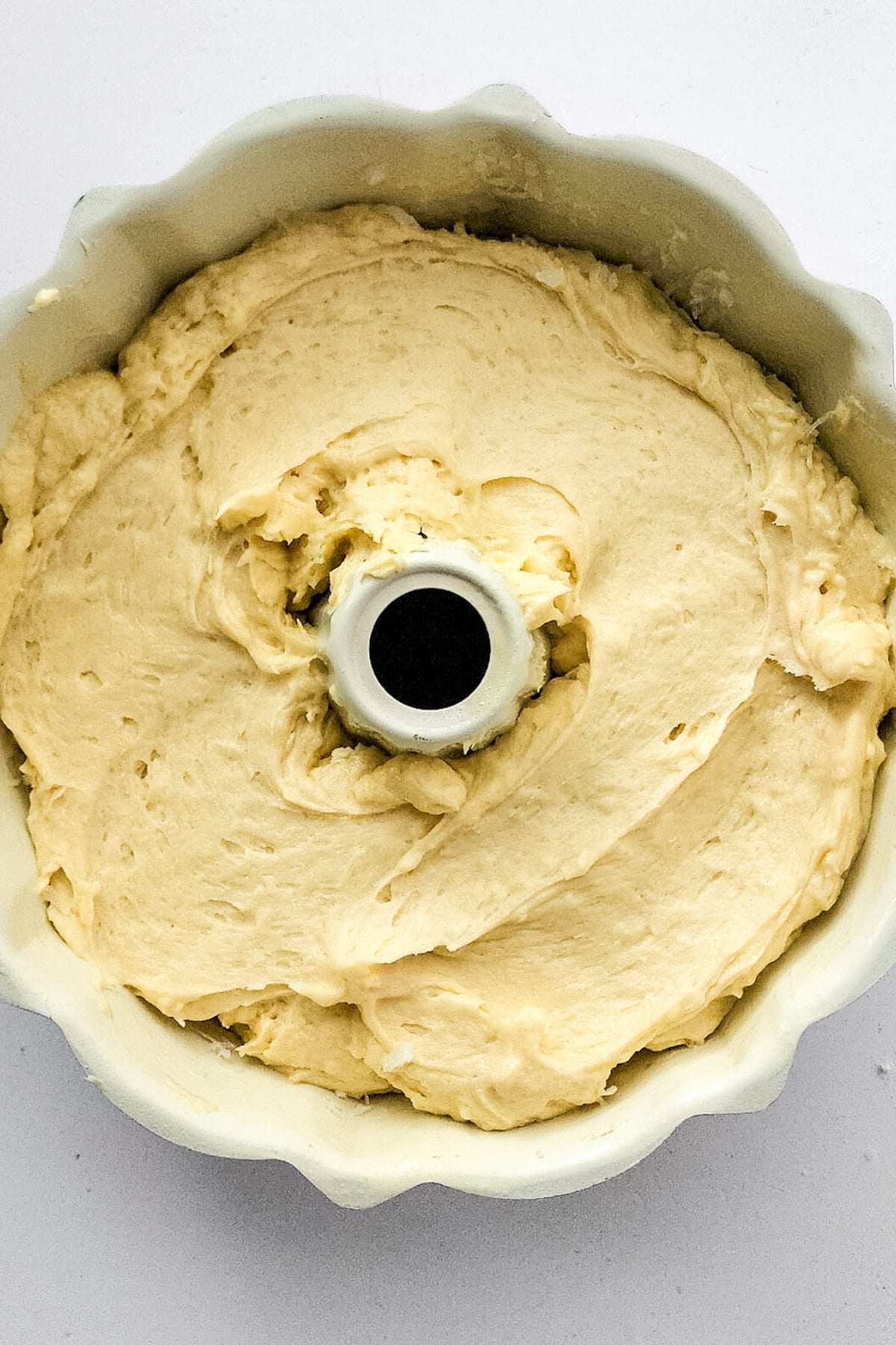 Cake batter in bundt cake pan.