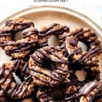 Homemade Samoas cookies on a plate.