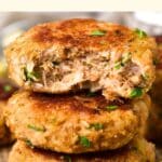 A stack of half-eaten crab cakes.