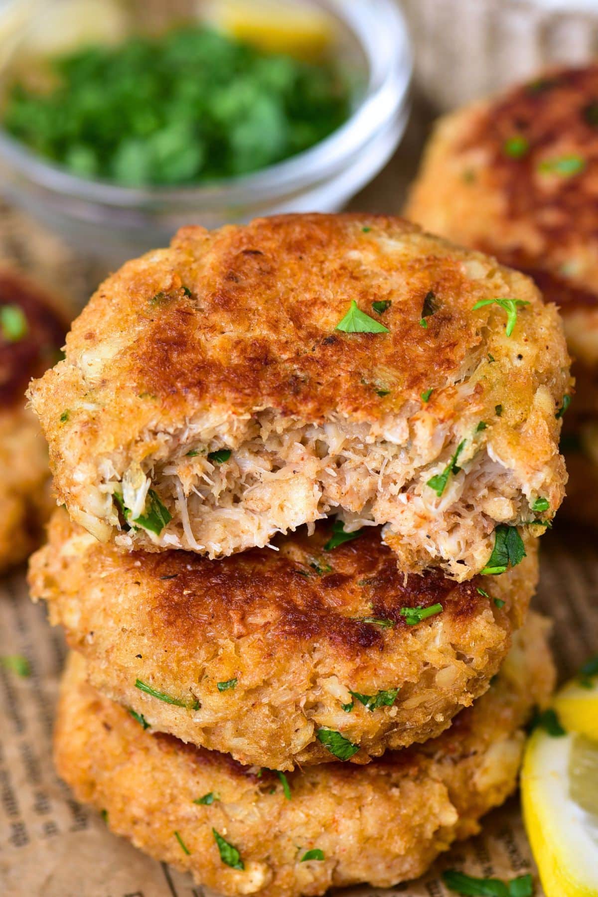 A stack of half-eaten crab cakes