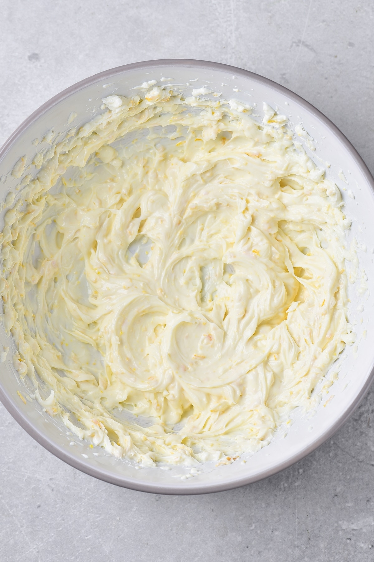 Cream cheese frosting in bowl.