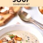 Mushroom soup topped with sautéed mushrooms and fresh parsley.