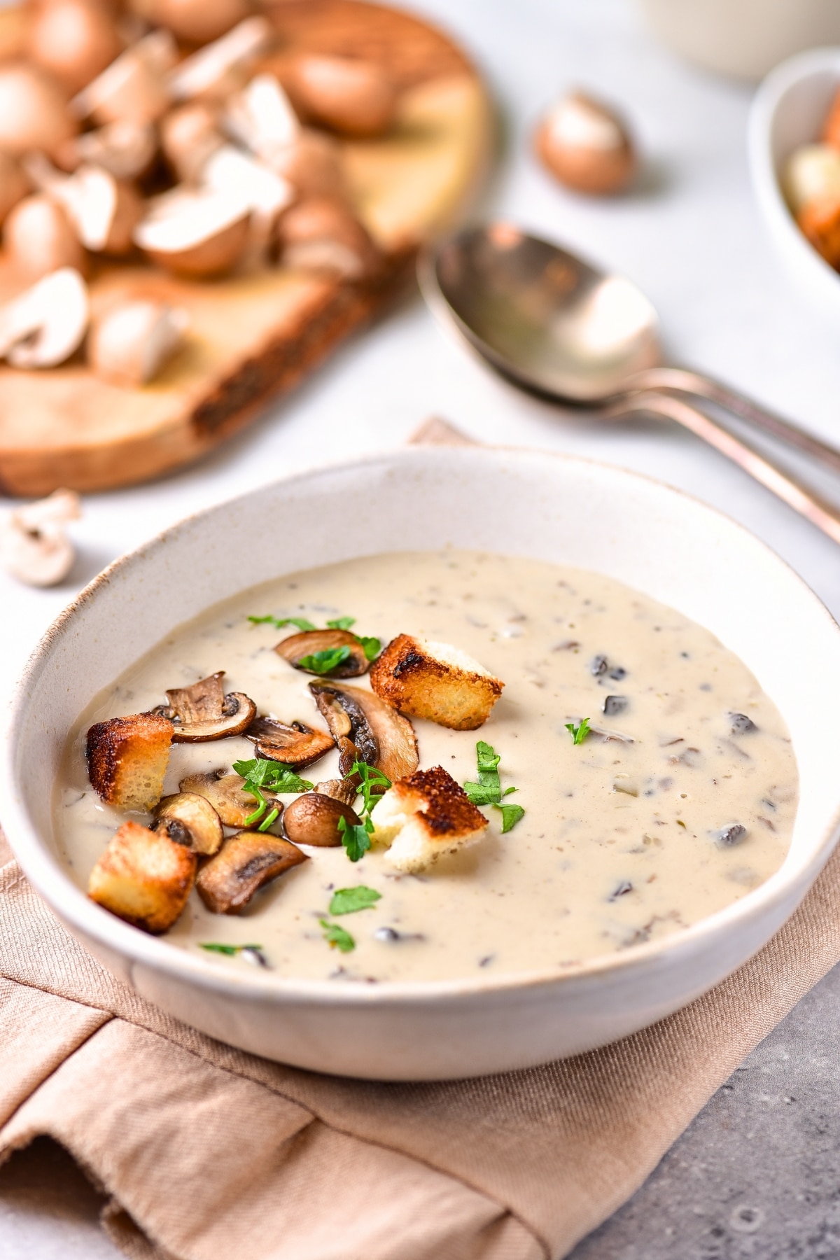 Creamy mushroom soup topped with sautéed mushrooms, croutons and parsley.
