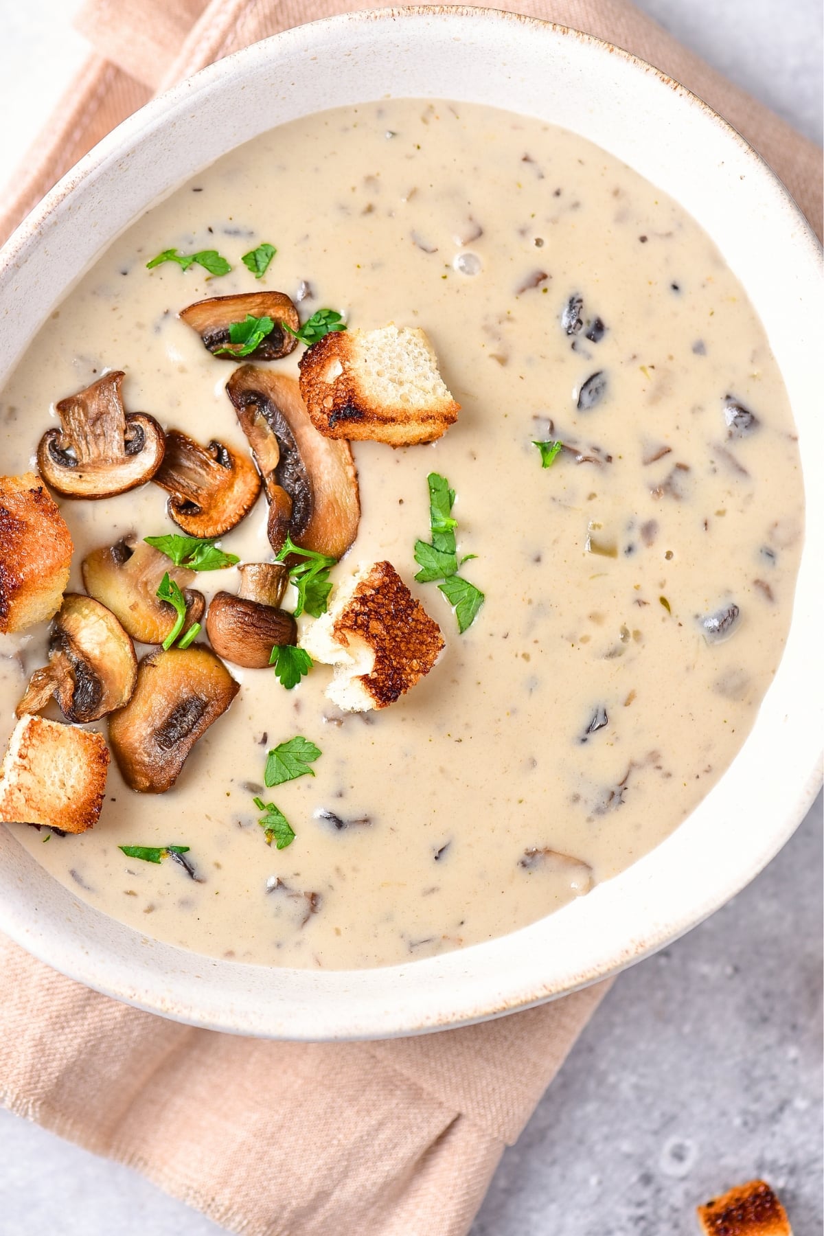 Top down view of bowl of gluten-free mushroom soup.