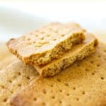Up close shot of half-eaten almond flour graham crackers.
