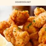 A bowl of breaded chicken pieces.