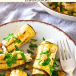 Top down view of a plate of eggplant rolls.