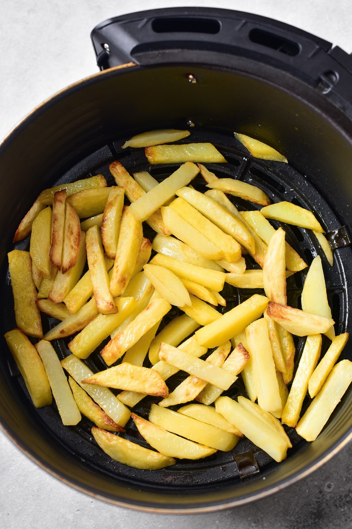 Cooking potatoes in air fryer.