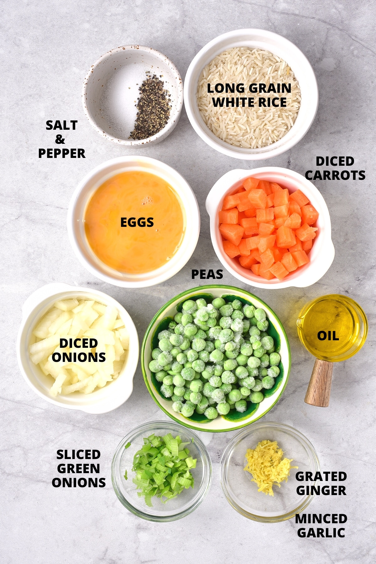 Ingredients for gluten-free fried rice recipe laid out on marble board.