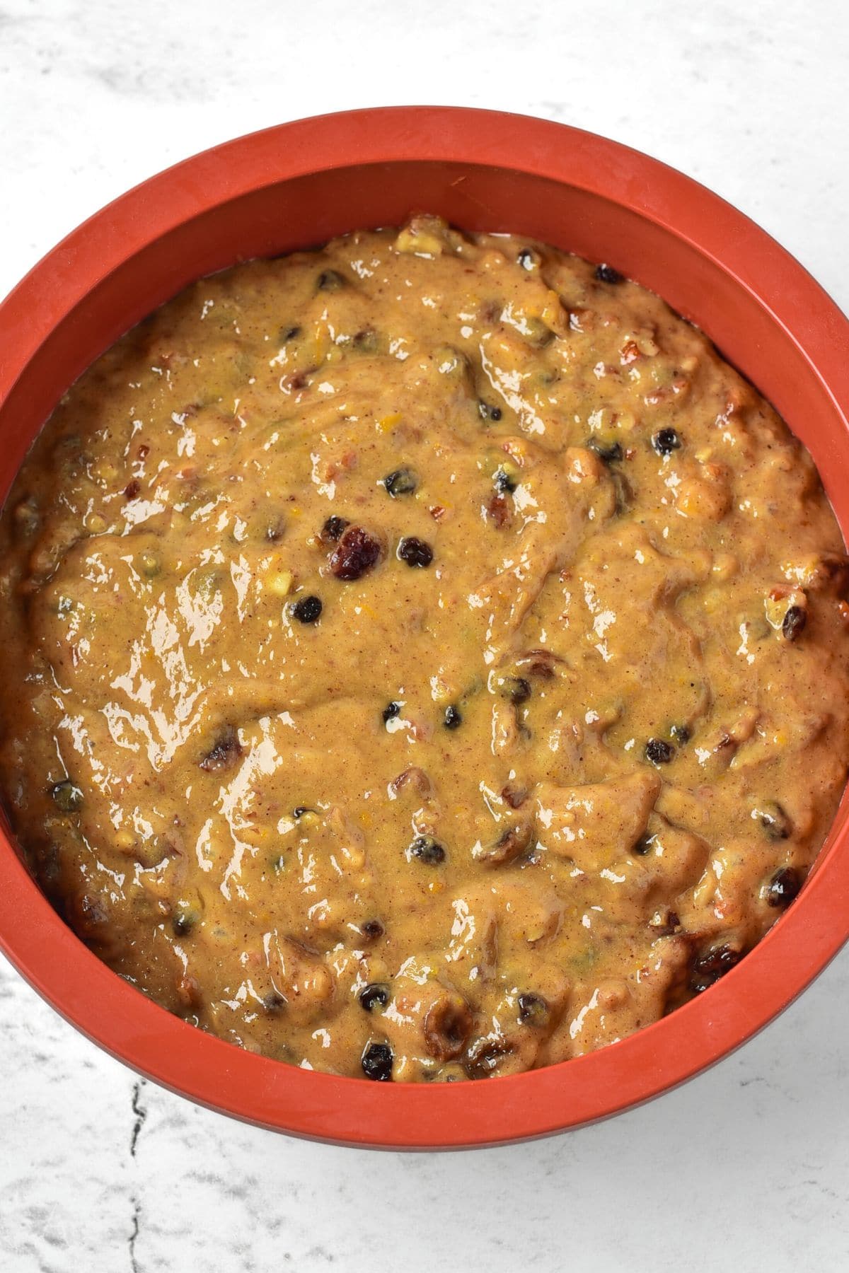 Cake batter in round cake pan