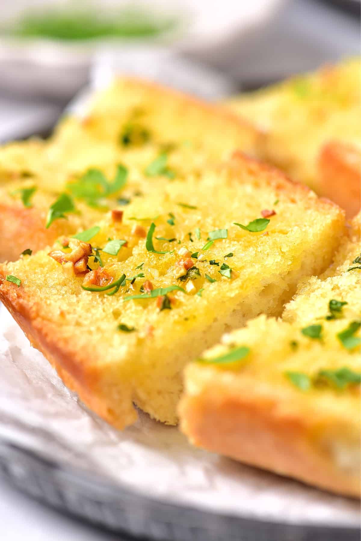 Up close view of pieces of garlic toasts.