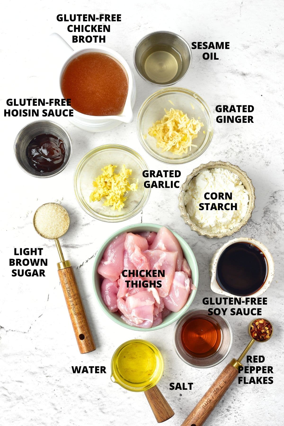 Ingredients for gluten-free General Tso's chicken laid out on marble board
