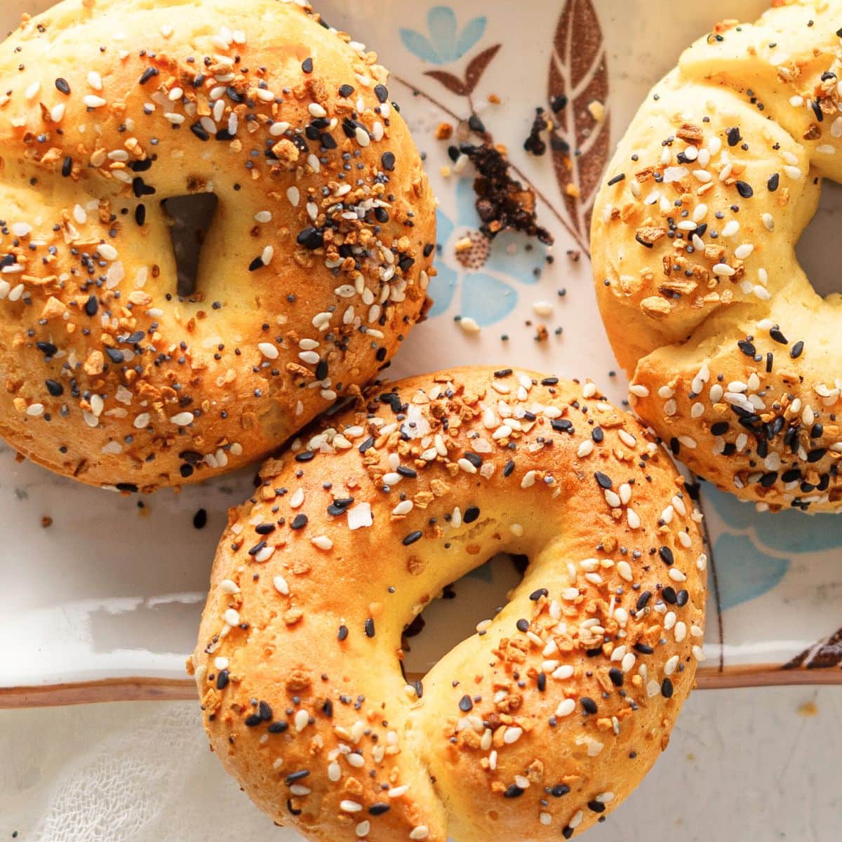 Homemade everything bagels on plate