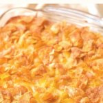 Gluten-free hash brown casserole in glass baking dish.
