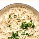 Fettuccine alfredo in a pan.