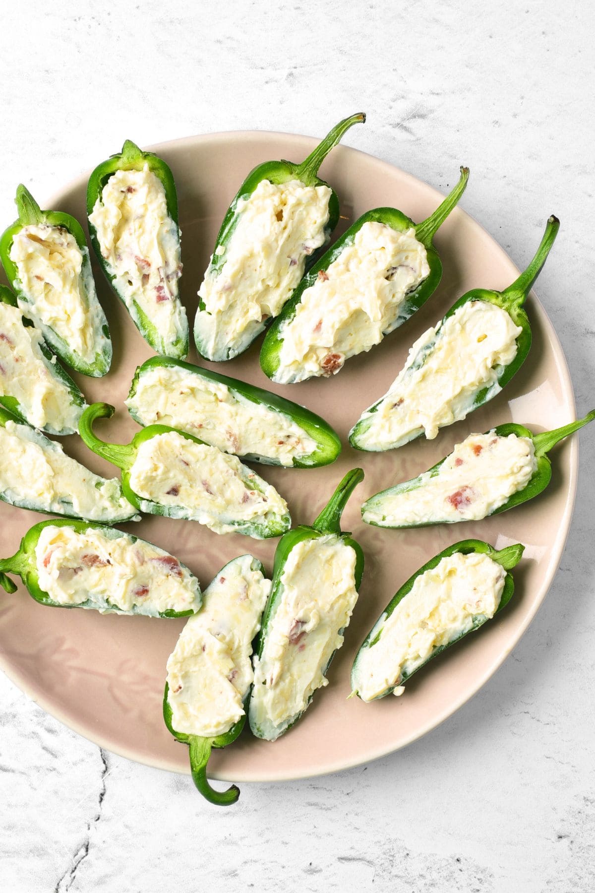 Jalapeño halves stuffed with creamy filling