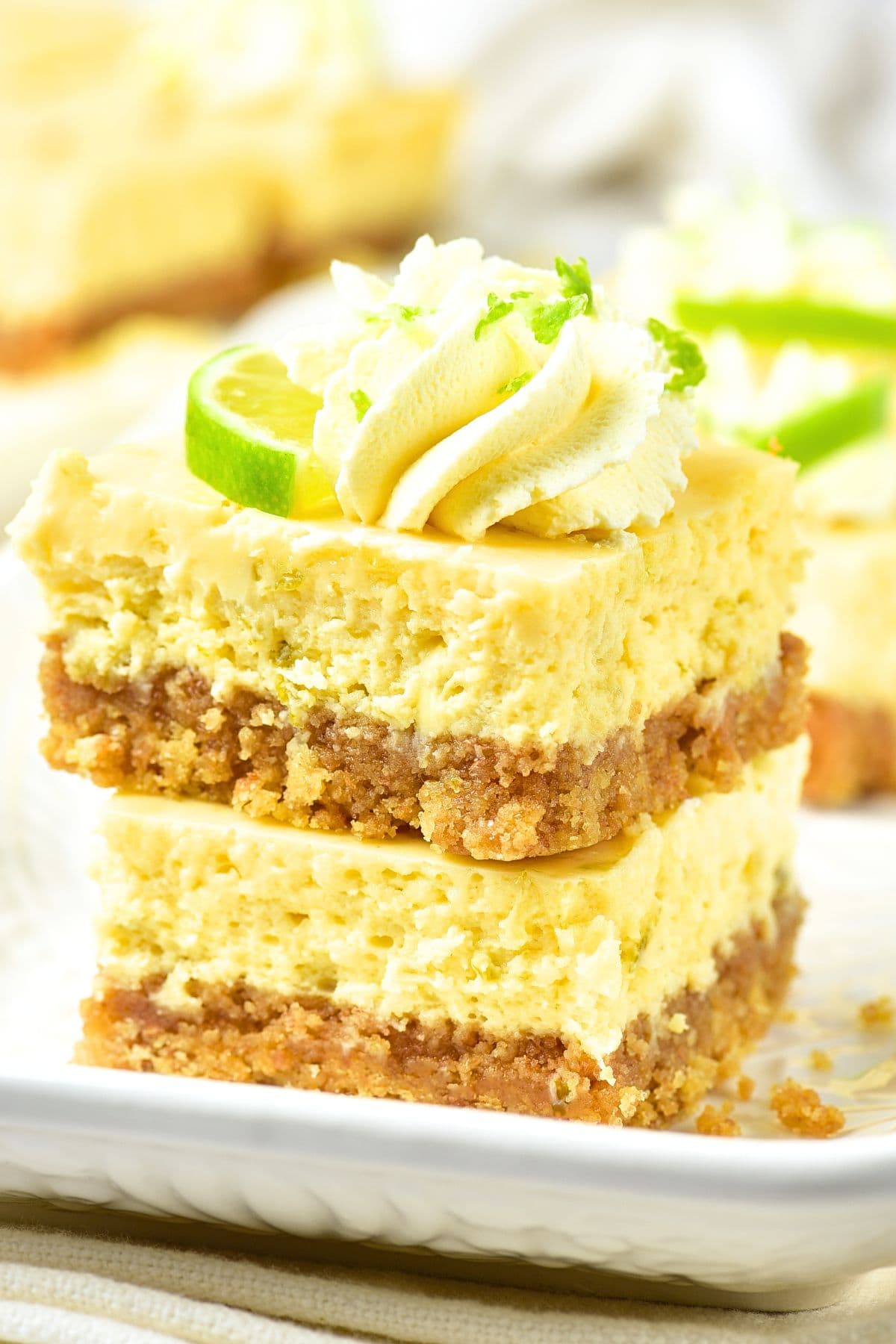 Up close view of a stack of gluten-free key lime bars
