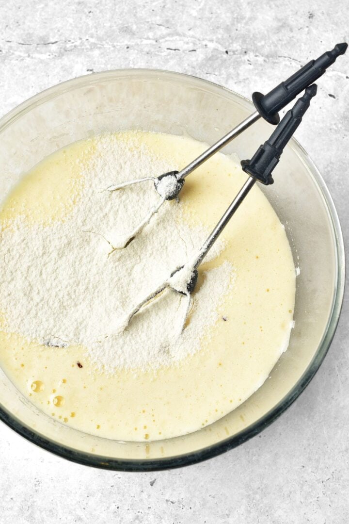 Adding flour to pale yellow liquid