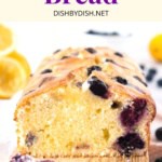 Up close shot showing texture of a half-sliced lemon blueberry loaf.