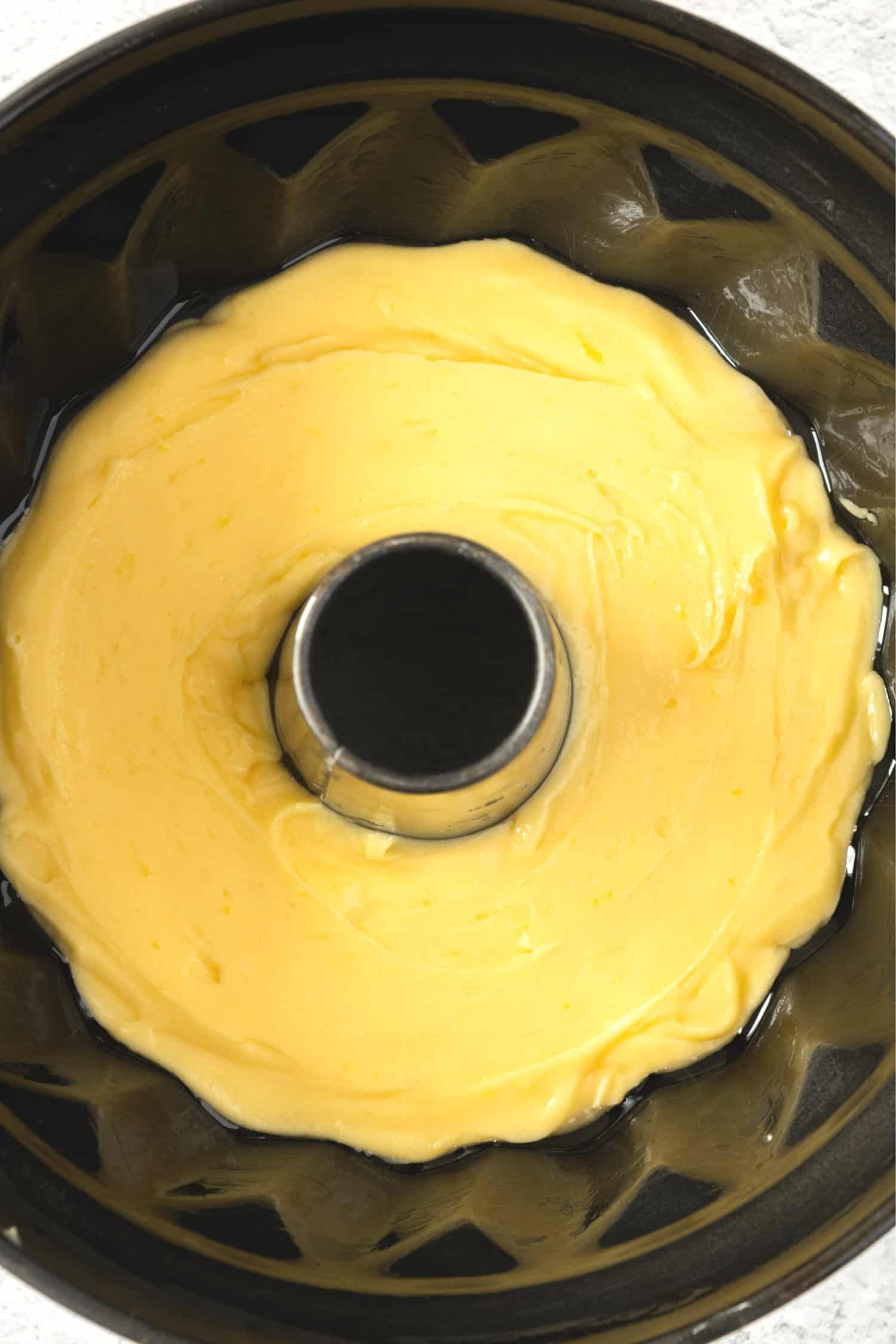 Lemon cake batter in bundt cake pan.