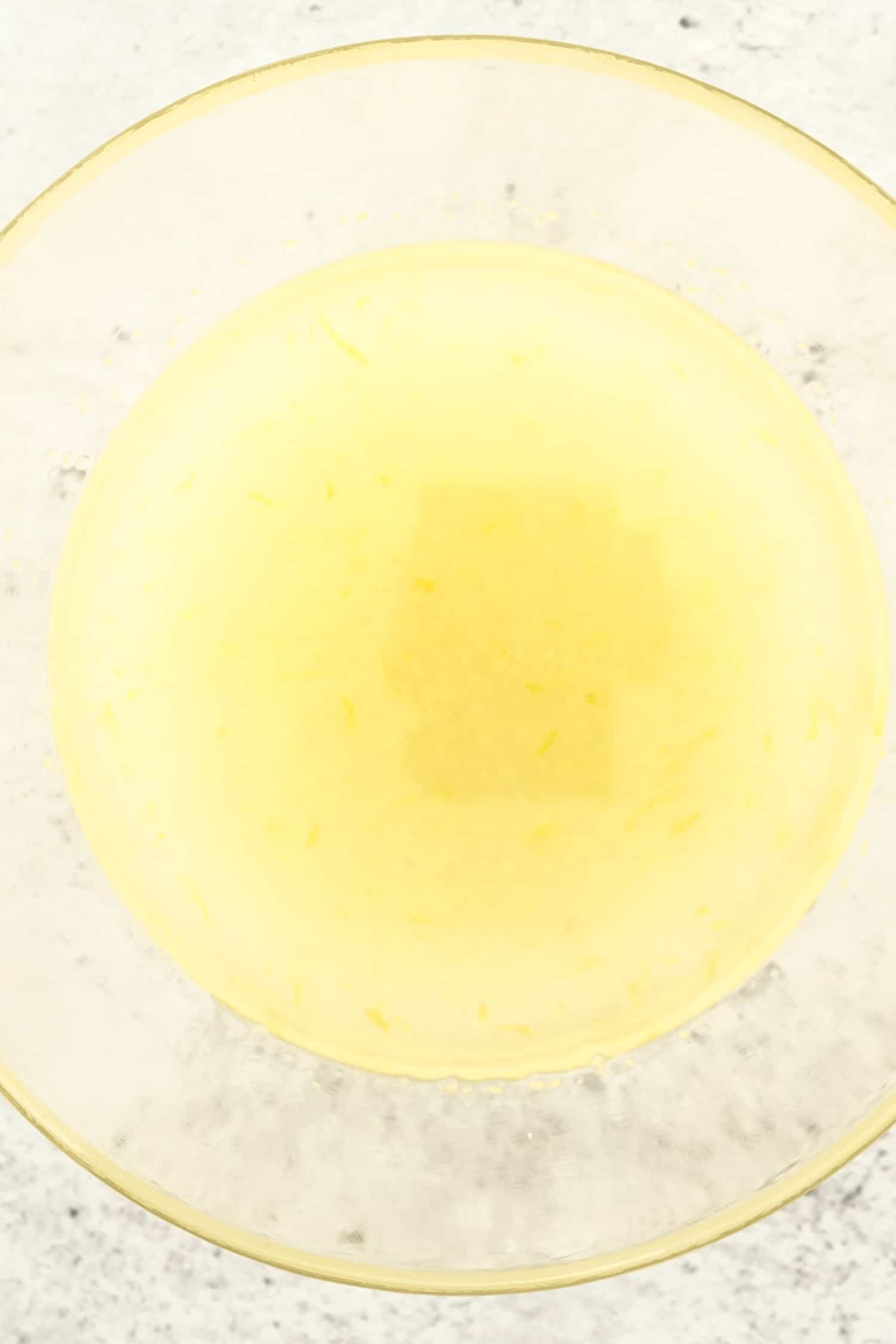 A pale yellow mixture in a glass bowl.