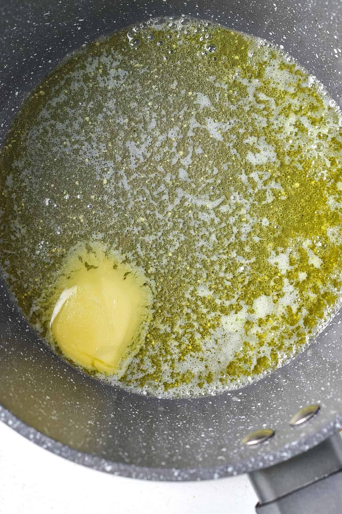 Butter melting in a saucepan.