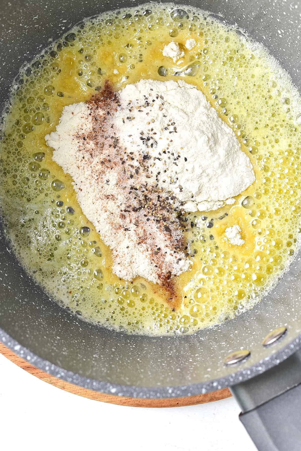 Melted butter, flour and spices in a pan.