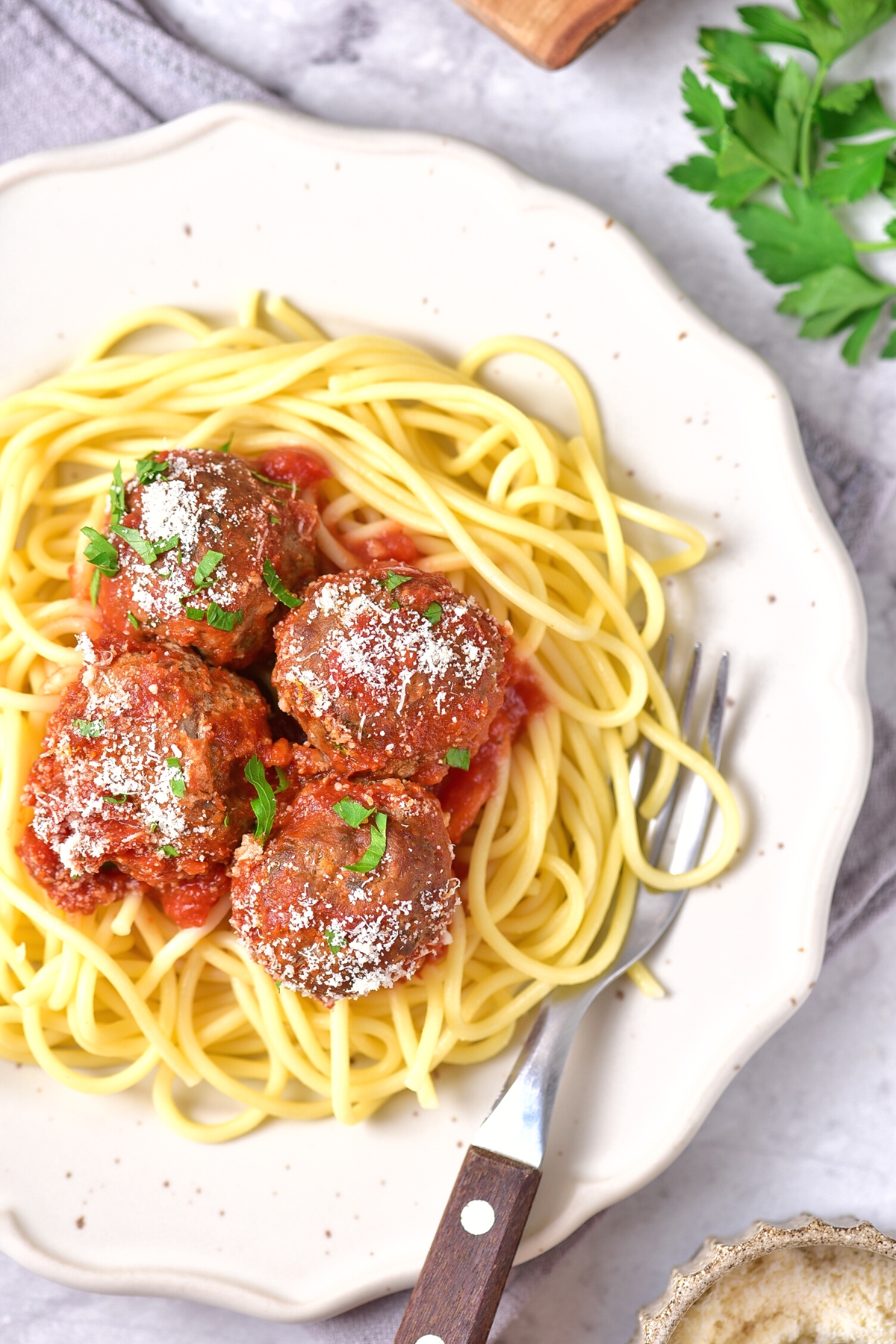 A plate of spaghetti with homemade gluten-free meatballs.