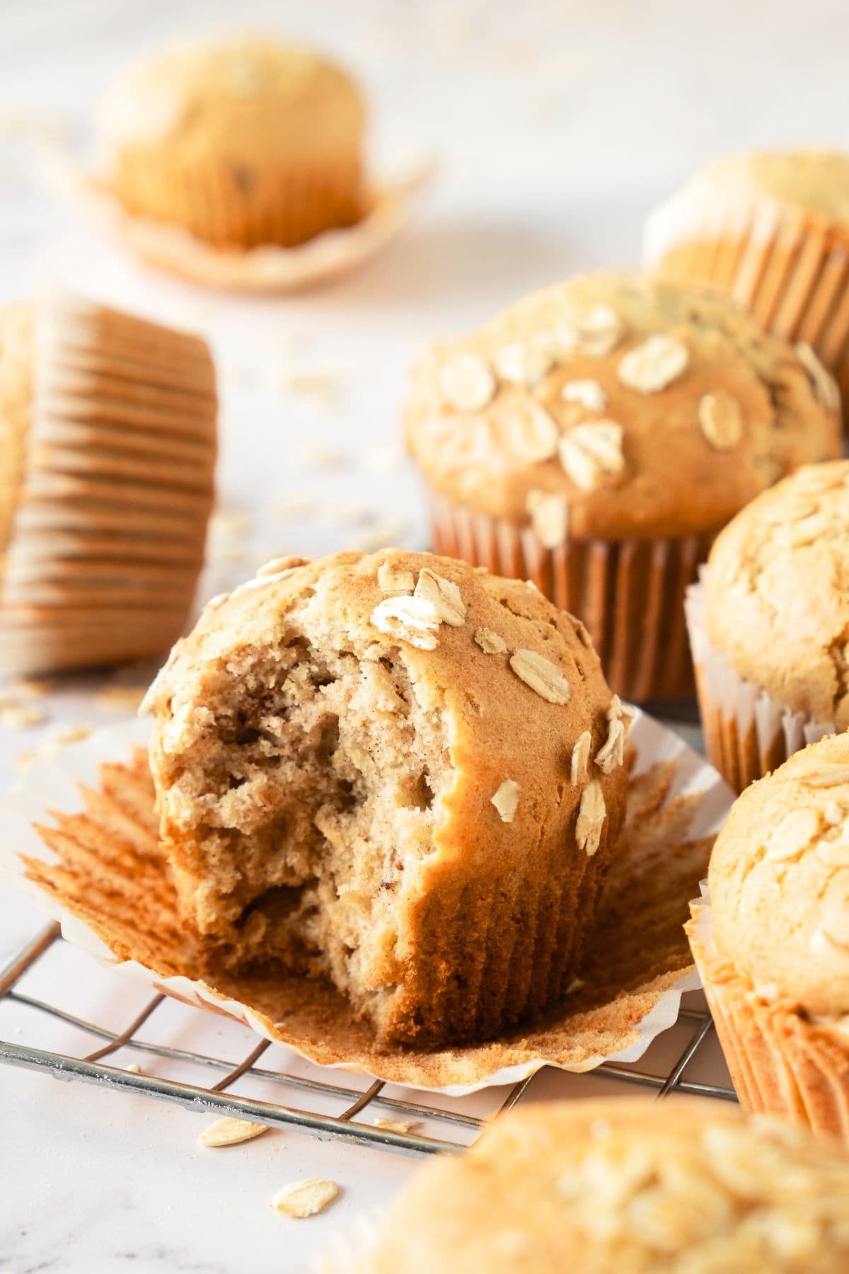Up close view of a half-eaten gluten-free oat muffin
